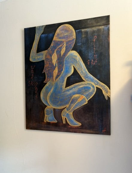 bold figurative painting of a crouching female silhouette in blue and gold wall art